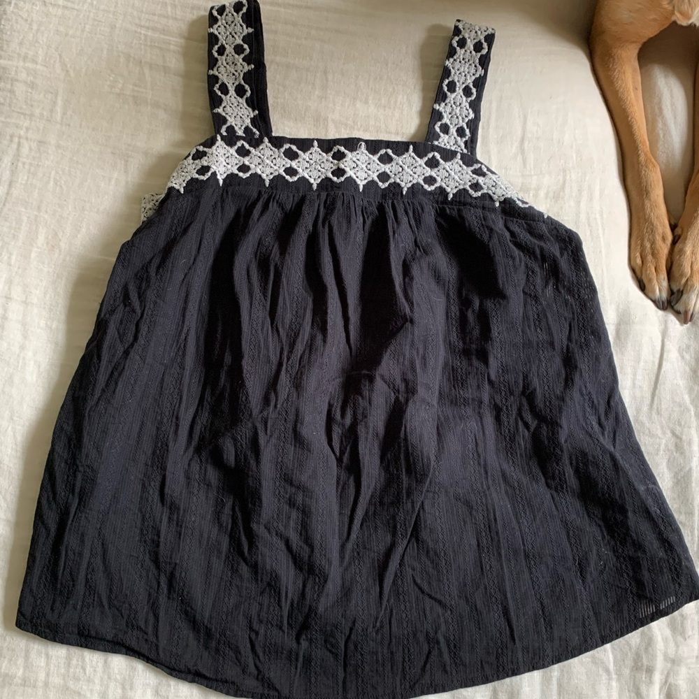 Embroidered peplum tank